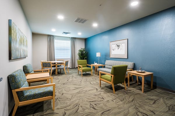 Bright common area with seating and decor