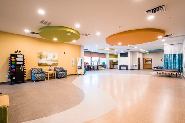 Bright interior common area with colorful ceilings