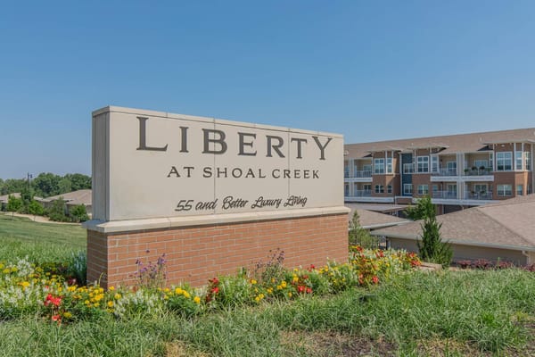 Exterior sign of Liberty at Shoal Creek with landscaping