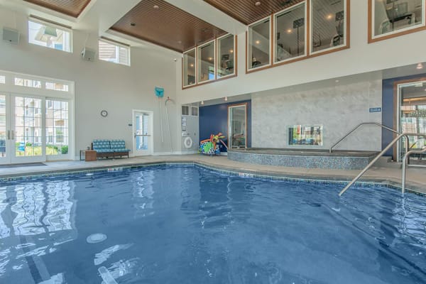 Indoor swimming pool area in a senior living facility