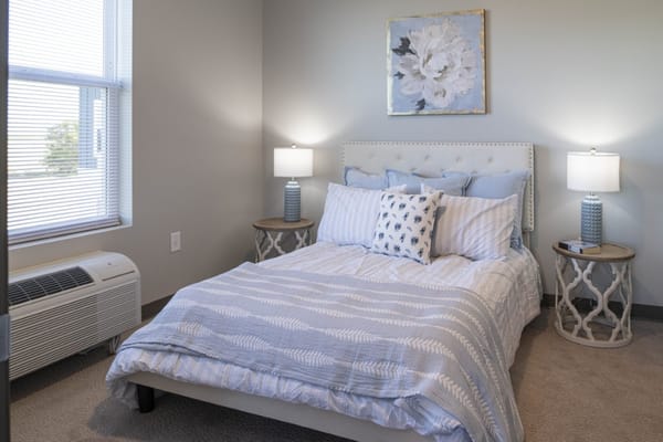 Cozy private bedroom with floral decor and soft lighting