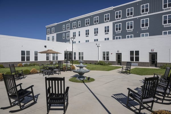 Outdoor courtyard area with seating and fountain