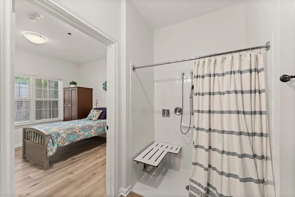 Interior view of a resident room with shower space
