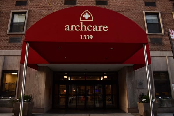 Entrance of ArchCare facility with logo