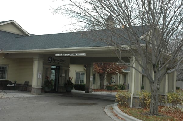 Entrance to Edgewood Spring Creek Overland with a sign indicating low clearance