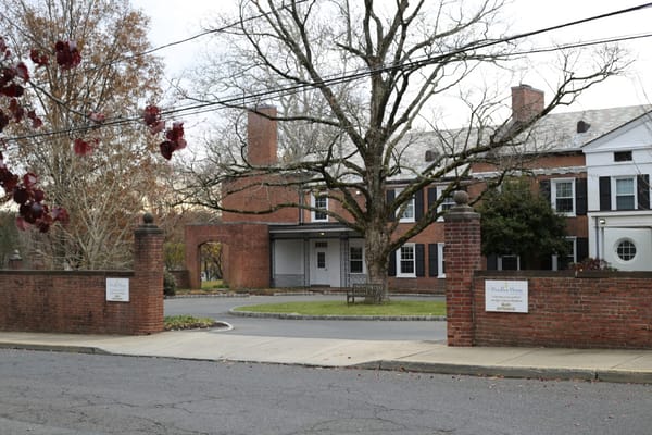 Exterior view of Bradley Home & Pavilion with landscaping