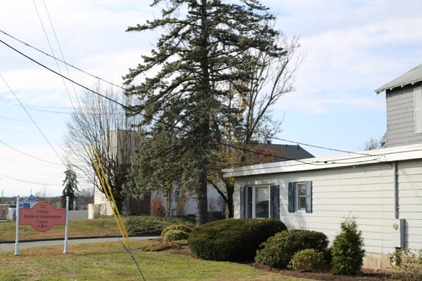 Exterior view of a healthcare facility with signage
