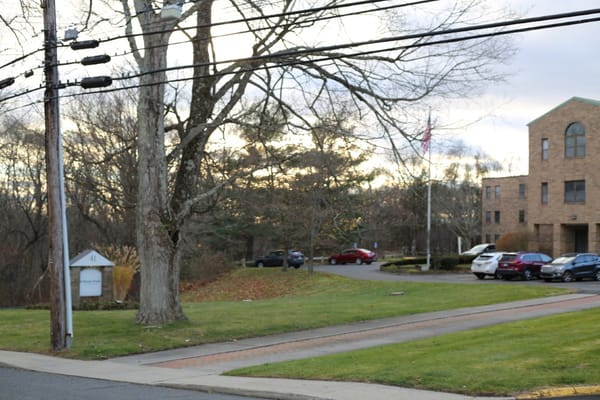 Exterior view of Shady Knoll Center with landscaping