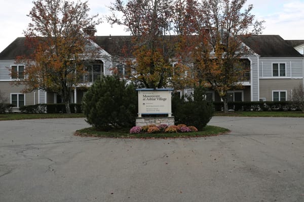 Masonicare at Ashlar Village welcome sign with autumn foliage