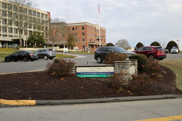 Sign with directions to Masonic Healthcare Center and nearby health facilities.