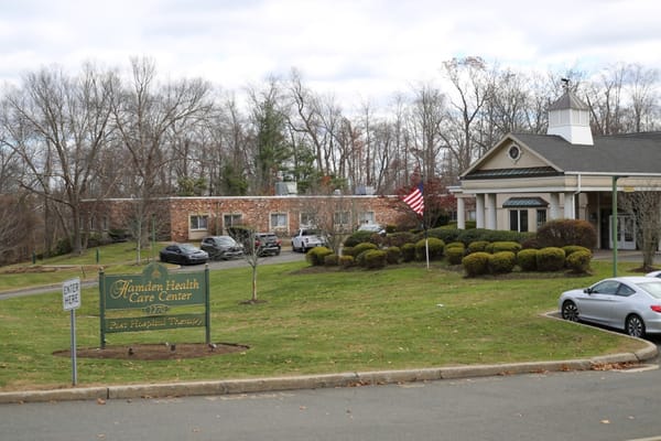 Entrance of Hamden Health Care Center with landscaping