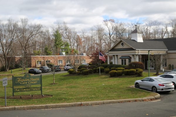 Exterior view of Hamden Health Care Center with sign