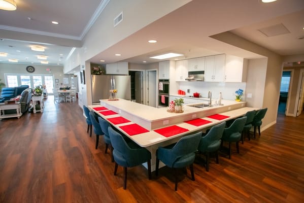Bright and spacious activity room with kitchen area