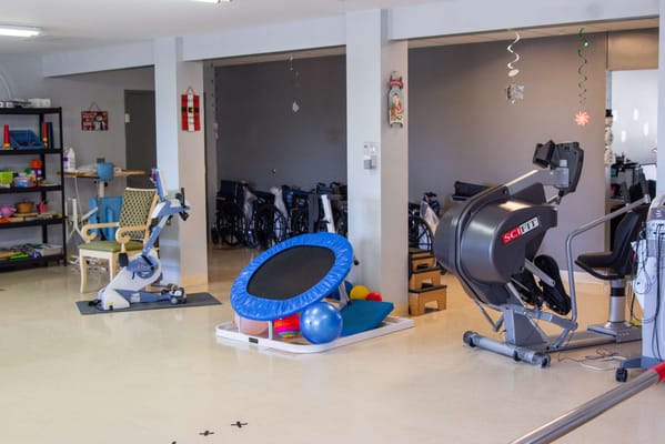 Interior view of a fitness area with exercise equipment