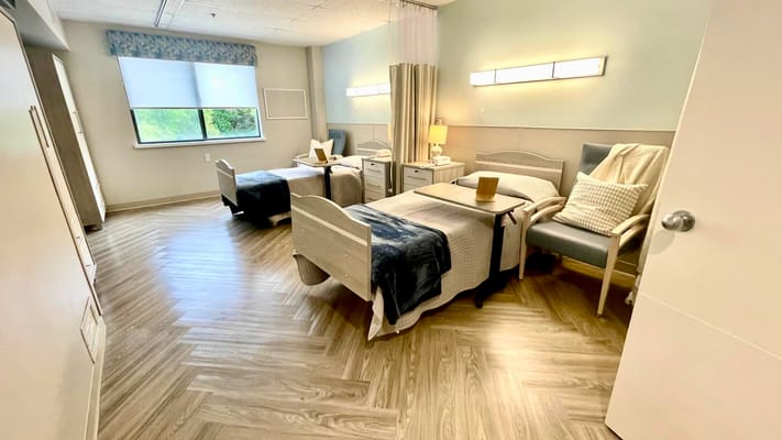 Interior view of a shared resident room with two beds