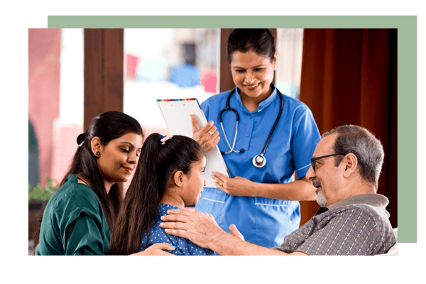 Healthcare staff interacting with residents in a common area