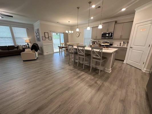 Bright and airy kitchen and living area in a modern facility