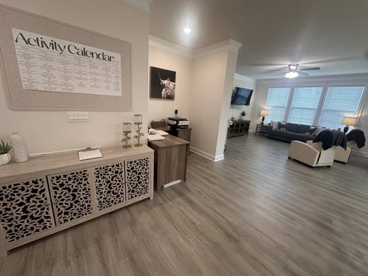 Bright interior of a common area with seating and decor
