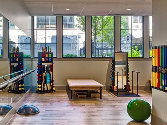 Therapy room with exercise equipment and therapy tools