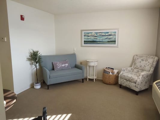 Cozy private room with seating and decor