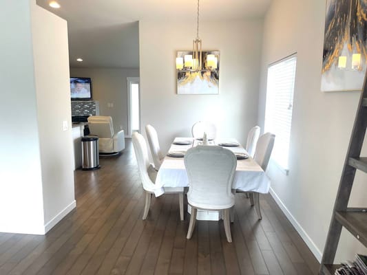 Bright dining area with a set dining table