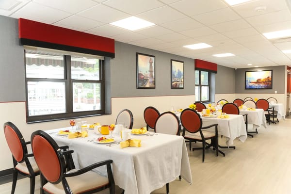 Interior dining area with tables set for a meal