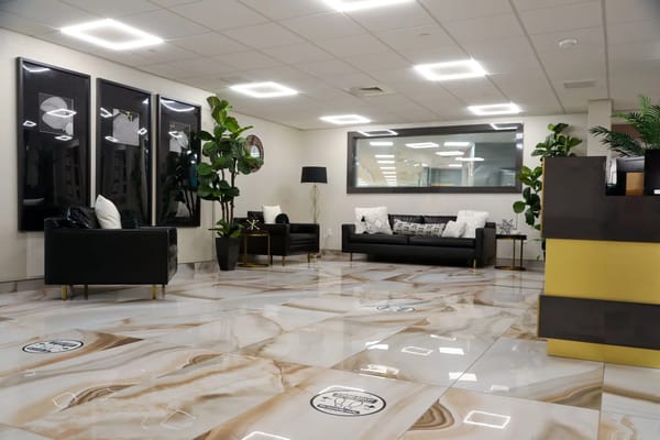 Brightly lit common area with modern furniture