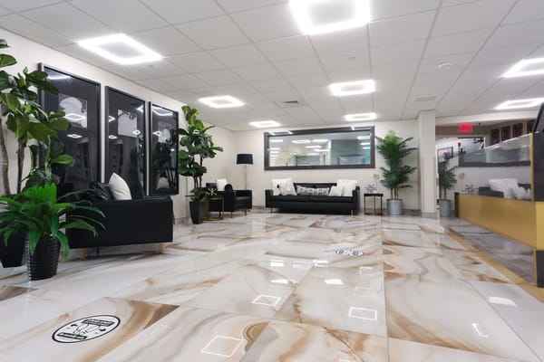 Modern lobby area with comfortable seating and greenery