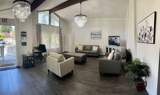 Bright common area with seating and decor