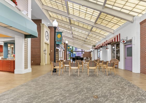Common area with seating in a bright, airy space