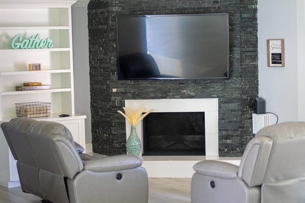 Cozy common area with comfortable seating and a television
