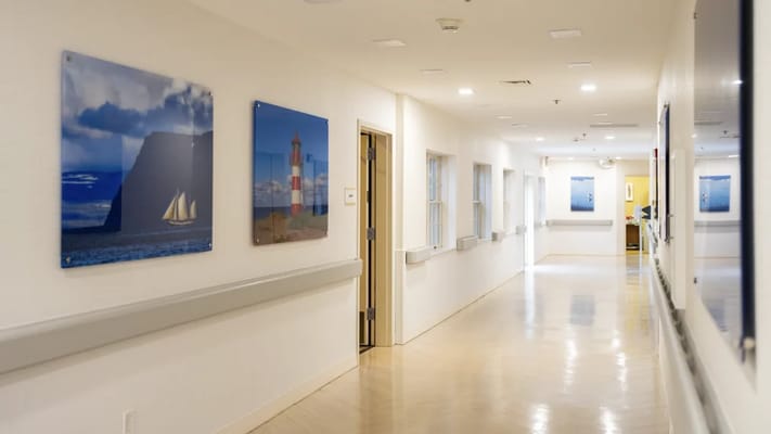 Bright interior hallway with artwork on the walls