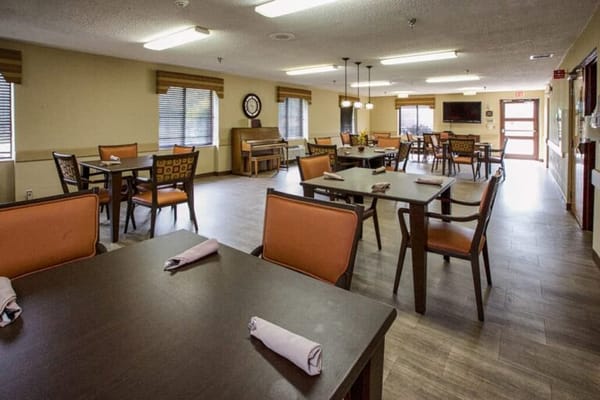 Bright dining room with tables and chairs