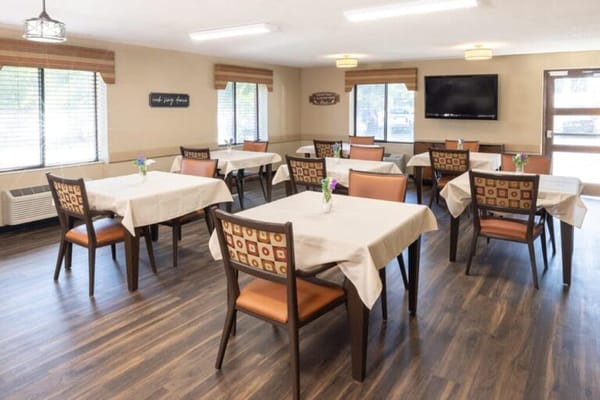 Dining area with tables set for meals