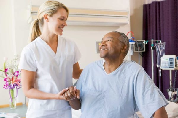 Nurse interacting with a resident in a care facility
