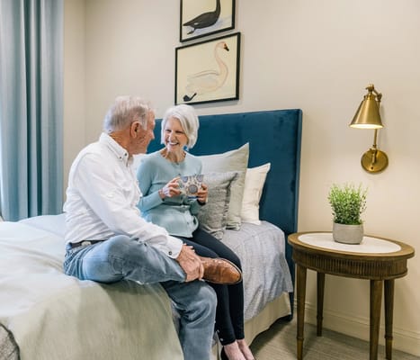Residents enjoying a warm conversation in a private room