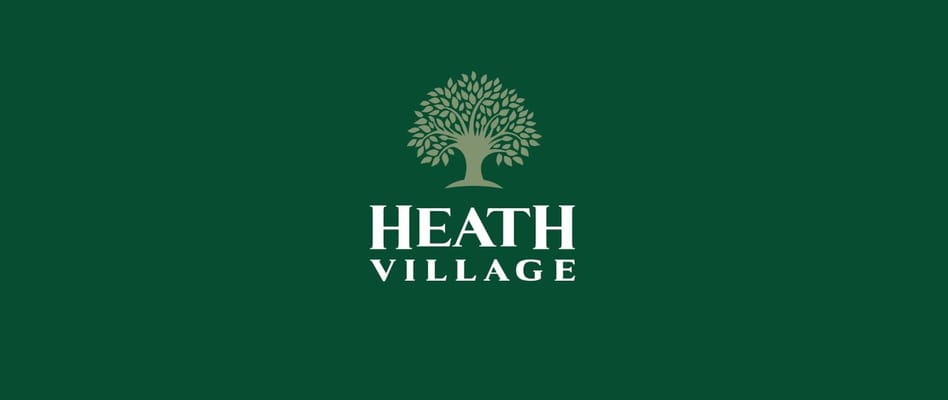 Logo of Heath Village on a green background