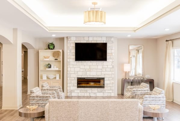 Bright lounge area with modern furniture and decor