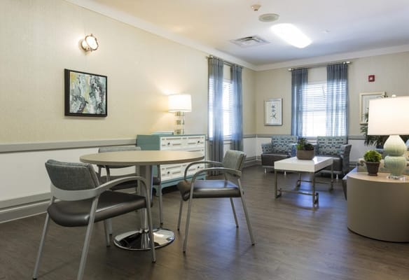 Bright common area with seating and decor