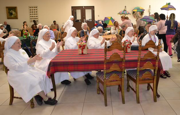 Residents engaged in a lively gathering with decorations