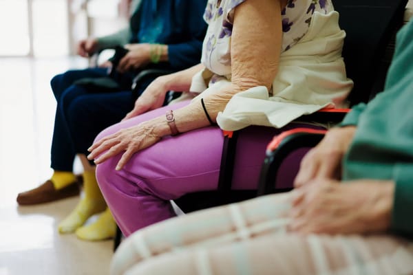 Residents sitting together in a common area