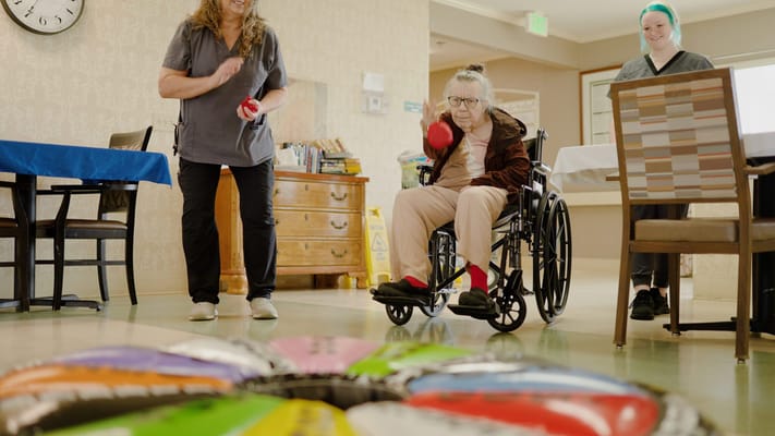 Residents engaging in an interactive game activity