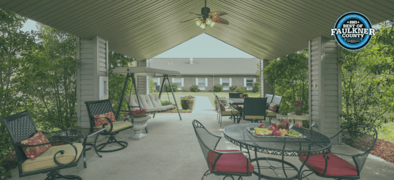 Covered outdoor patio with seating and refreshments
