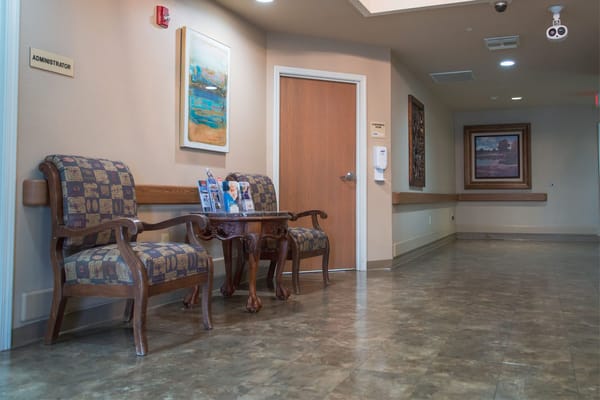 Interior hallway with seating and artwork