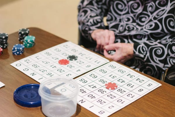Resident playing bingo during an activity