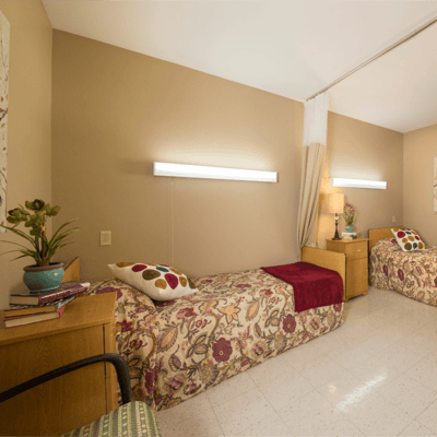 Cozy shared bedroom in a senior care facility