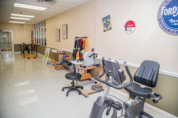 Rehabilitation exercise area with gym equipment