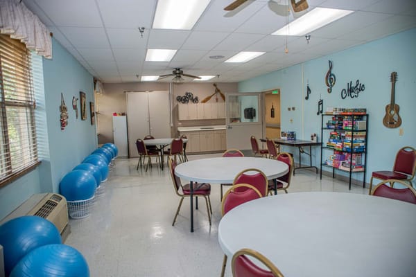 Activity room with tables and exercise balls