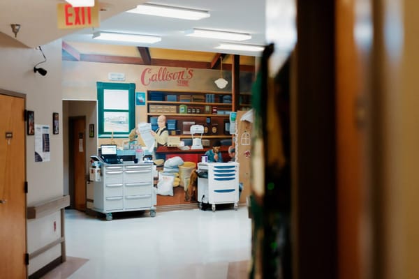 Interior of a facility store with staff present