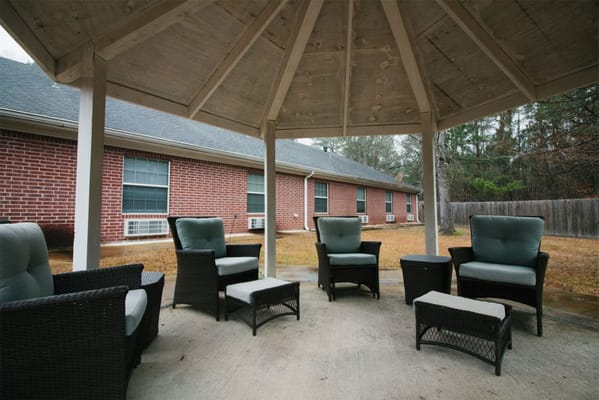 Outdoor seating area under a gazebo